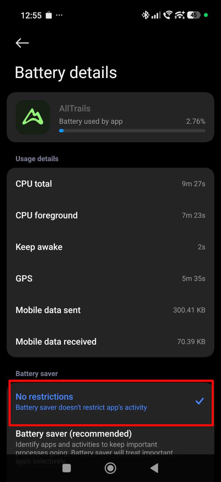 Smartphone screen showing Android battery settings with the 'Unrestricted' option selected for the AllTrails app to prevent GPS tracking errors.