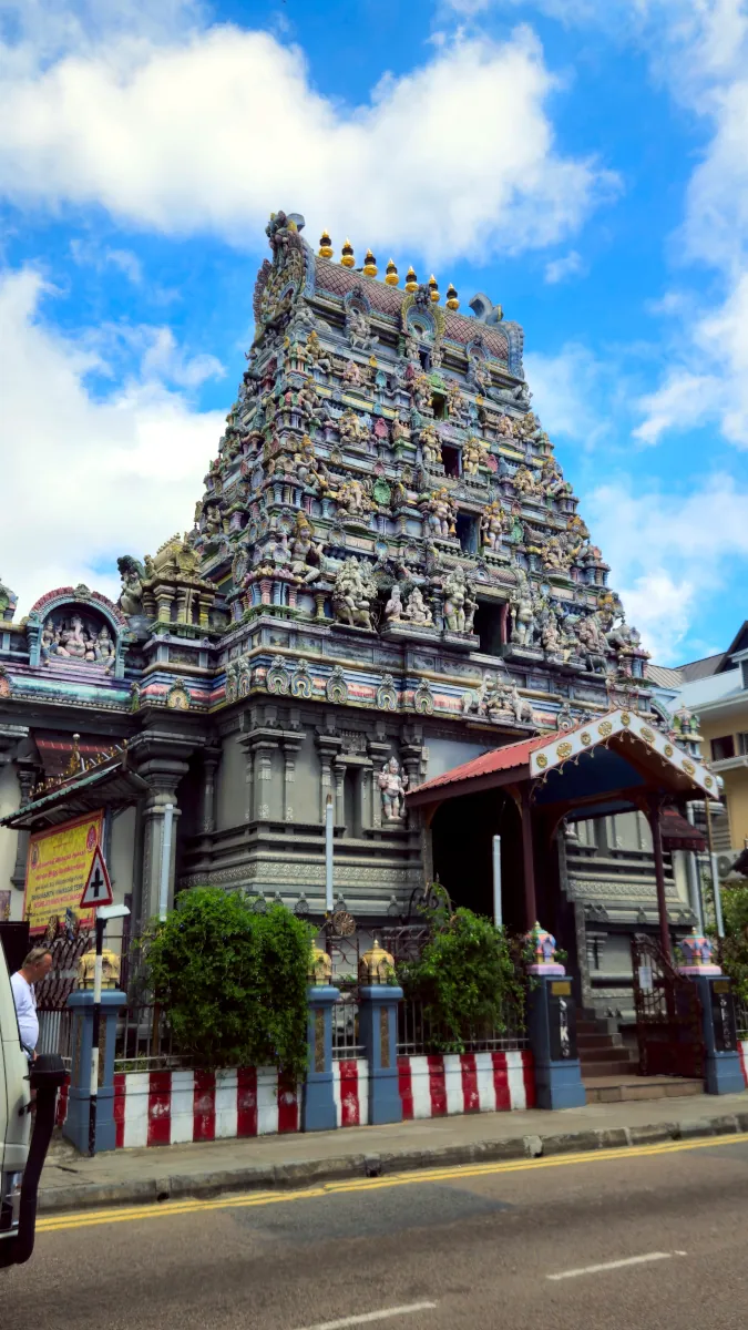 Intricately sculpted colorful facade of Arul Mihu Navashakti Vinayakar Hindu Temple in Victoria, Mahé, Seychelles.